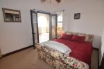 el dorado ranch  rental villa 433 - first bed room down stairs patio door open 